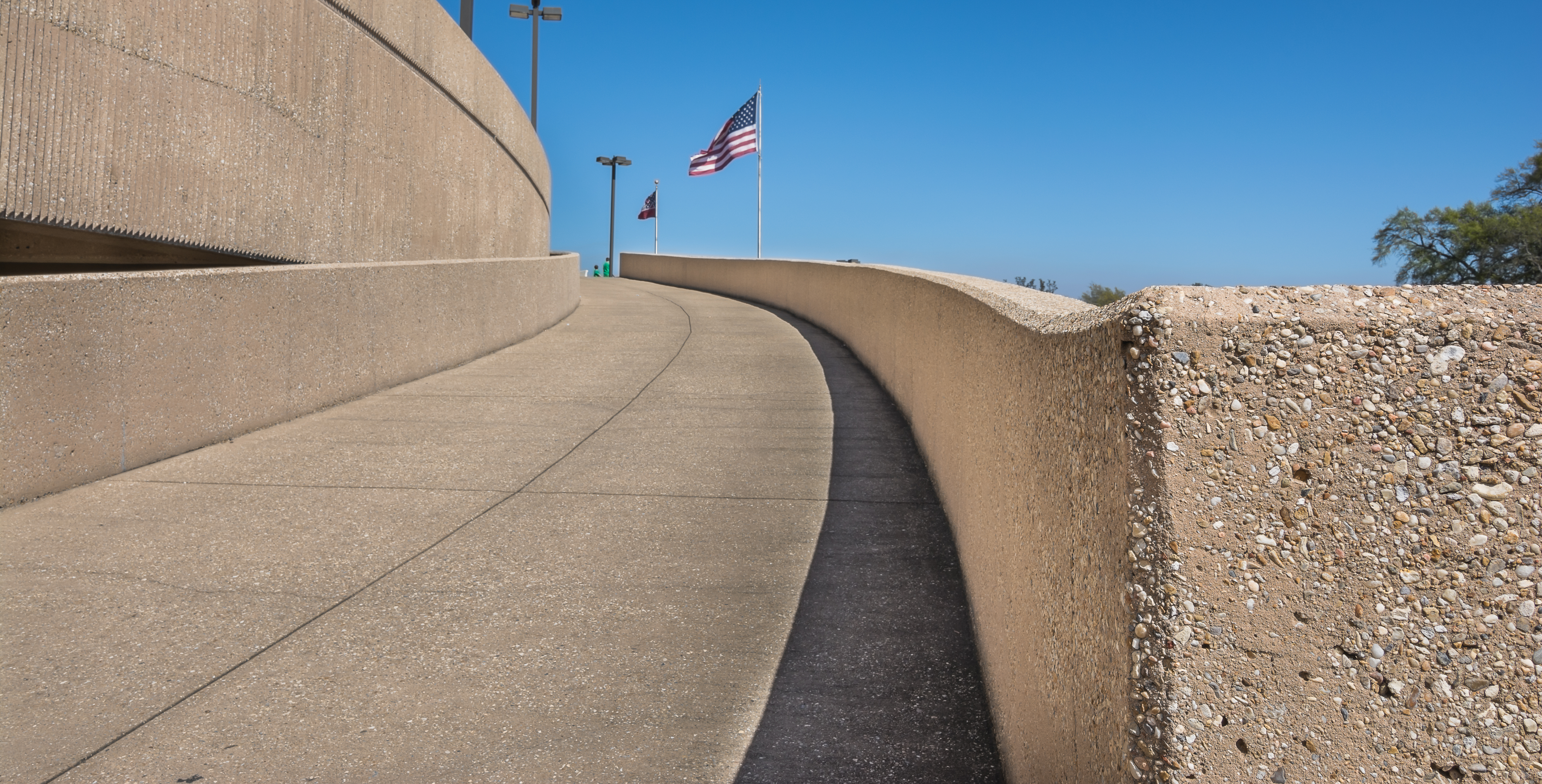   US government building with exposed aggregate concrete covering 